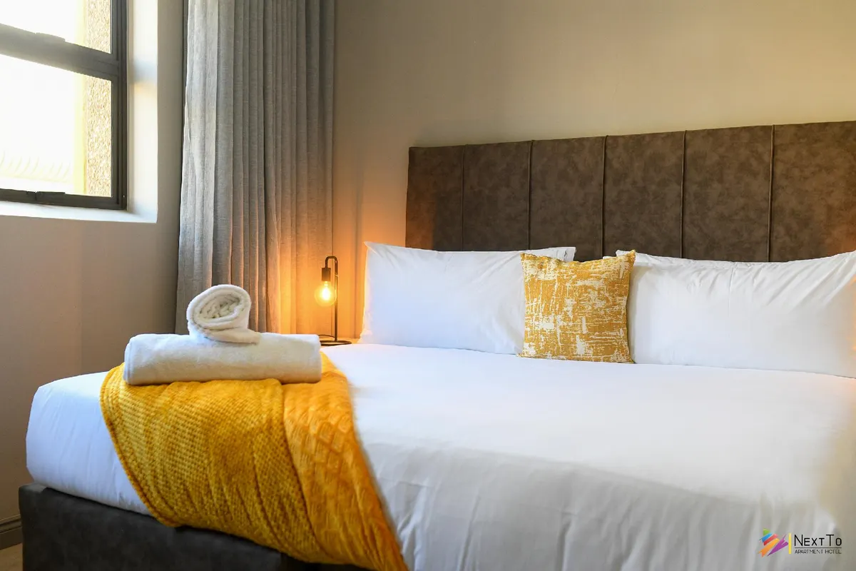 Next To Apartment Hotel