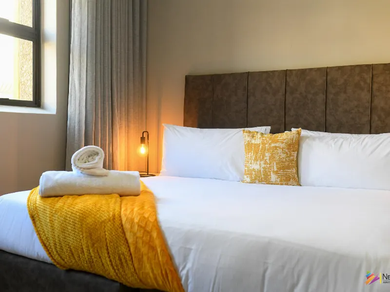 Next To Apartment Hotel