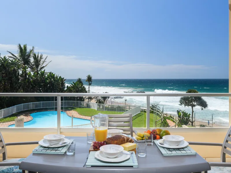 Wake up to a stunning ocean view and fall asleep to the sound of waves breaking