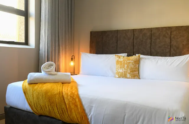 Next To Apartment Hotel